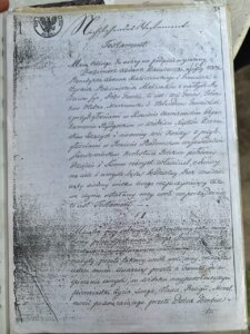 Rękopiśmienny dokument urzędowy z nagłówkiem i pieczęcią, zawierający szczegółowy tekst w języku polskim, zapisany starannym pismem.